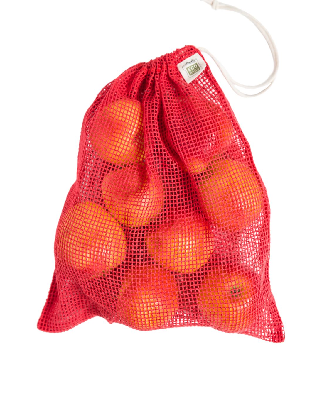 Large red cotton mesh bag filled with apples on a white background